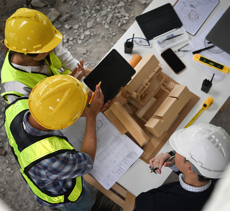 People in Hard hats representing a Breeam Assessment